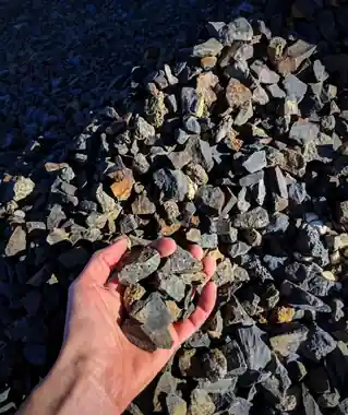 1 1/2 inch clean basalt chips in a hand