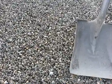 Pea gravel with a shovel