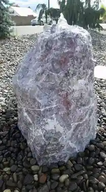 Turquoise quartzite boulder