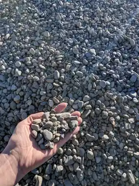 7/8 round rock in a hand