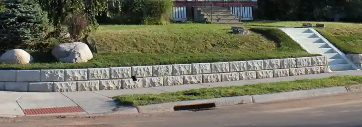 Terraced World Block wall holding a grassy slope